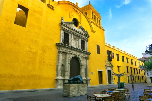 CARTAGENA, COLOMBIA - MAY 25: Statue by Fernando Botero in Santo Domingo plaza by a yellow church in Cartagena, Colombia on May 25, 2016