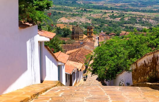 View of the town of Barichara with the cathedral visible at the bottom of the hill in Colombia