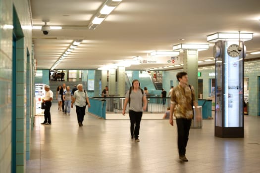 Berlin,Germany – June 21,2016: An underpass or tunnel of the subway station Berlin Alexanderplatz with passers-by on June 21,2016 in Berlin.
