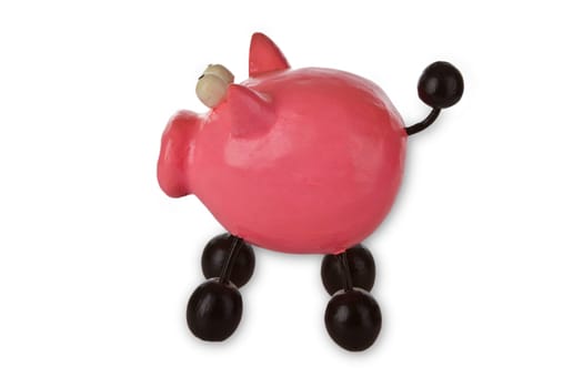 Figure of a pig freed on a white background