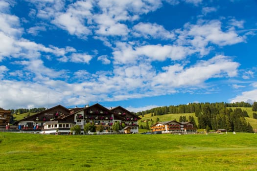 View of a group of houses in the village of Saltria in Seiser Alm