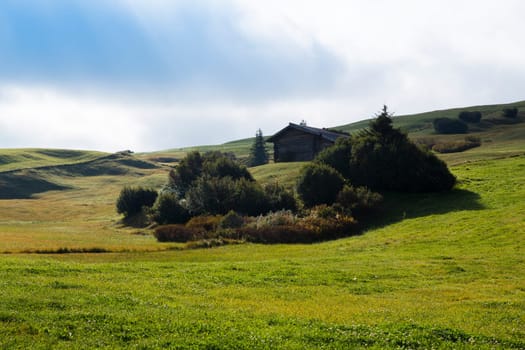View of a shelter in Seiser Alm on a cloudy day
