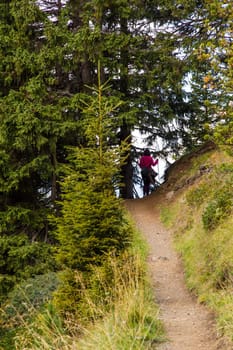 View of a hiking trail on Seiser Alm with hiker