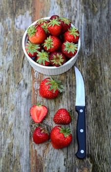 Strawberries with knife