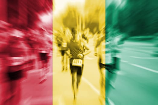 marathon runner motion blur blending with guinea flag