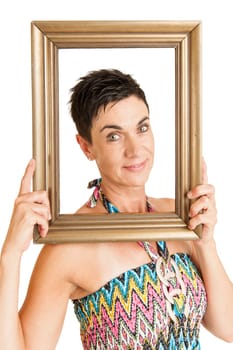 Upper body view of a middle-aged black-haired woman with gilded picture frames against a white background