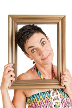 Upper body view of a middle-aged black-haired woman with gilded picture frames against a white background