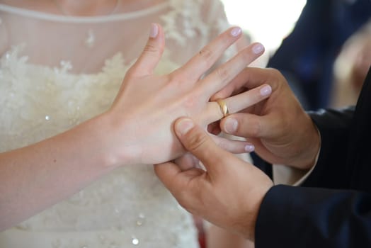 Ring exchange of bridal couple at the wedding ceremony