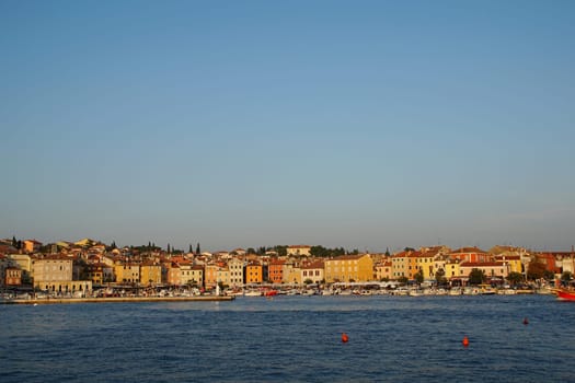 Boat harbour of Rovinj in the evening light