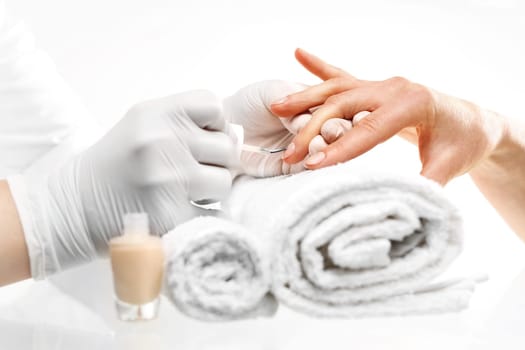 woman hands during a manicure salon