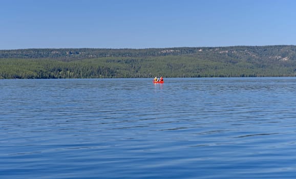Canoeing on a Shoshone Lake in Yellowstone National Park in Wyoming