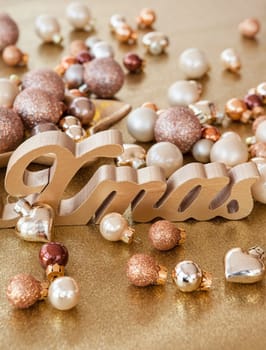 Scattered Christmas decorations with a golden background