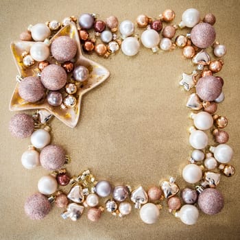Scattered Christmas decorations with a golden background