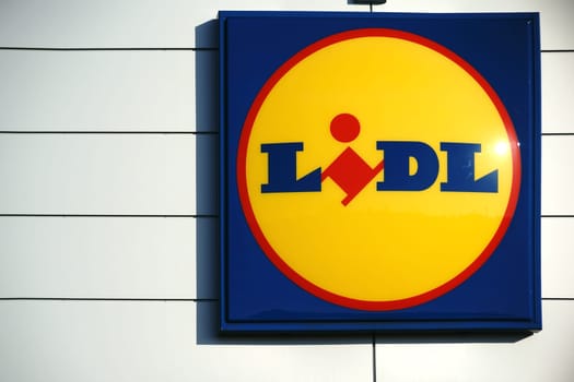 Mainz,Germany - October 29,2016: The luminous company sign of the food discounter Lidl on the façade of a food market on October 29,2016 in Mainz.