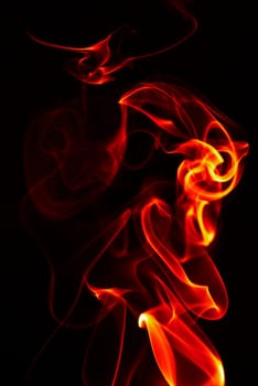 abstract single fire flame on black background
