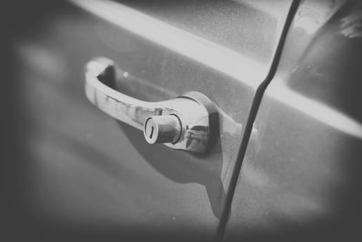 close up on old vintage car handle,black and white