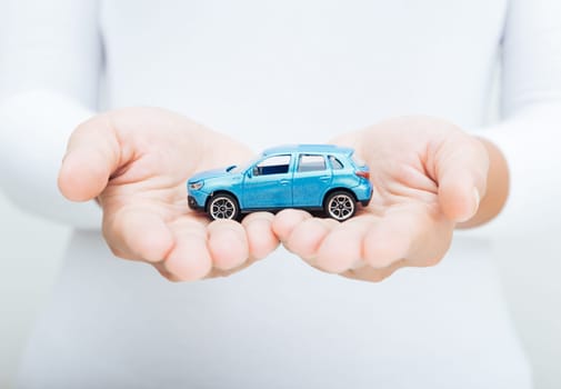 woman hand holding car business concept