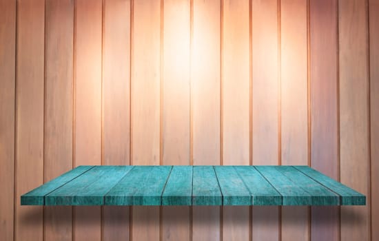 Top of blue wooden shelf with spot light on wooden wall background, stock photo