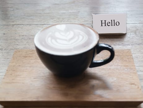 Hot cup of latte art coffee, stock photo