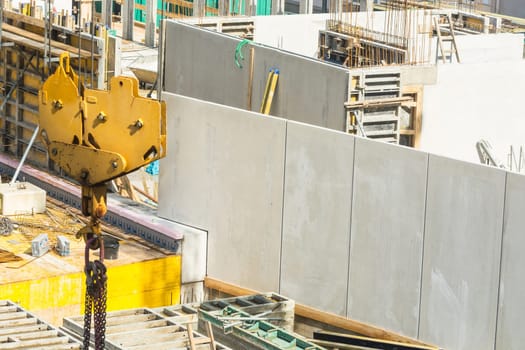 House construction made of steel and concrete for the construction of an apartment building with underground parking with concrete prefabricated walls...