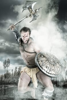 Ancient warrior or Gladiator fighting in a burned forest