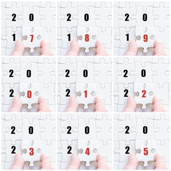 Photo collage with hand of business man completing the puzzle with the last missing piece