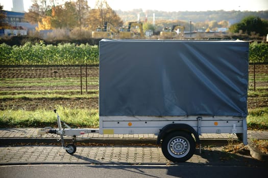 A car trailer for transporting small objects,tools and materials.