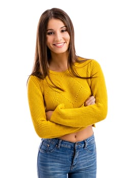 Beautiful and happy teenage girl pointing, isolated over white background