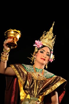 Traditional dancers dance in a park in Chiang Mai in northern Thailand.