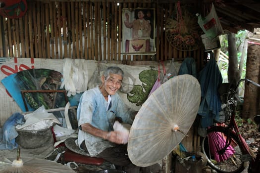 an Umbrella Factory near the city of chiang mai in the north of Thailand in Southeastasia. ...