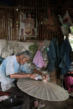 an Umbrella Factory near the city of chiang mai in the north of Thailand in Southeastasia. ...
