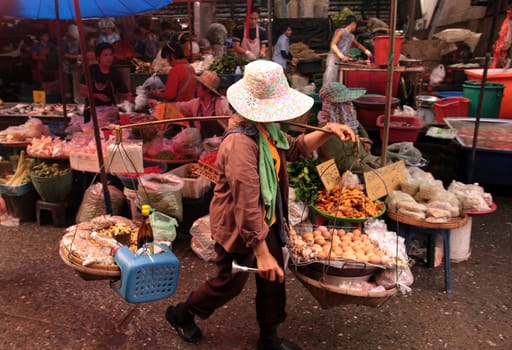 People at the Talat Warorot in the city of chiang mai in the north of Thailand in Southeastasia. ...