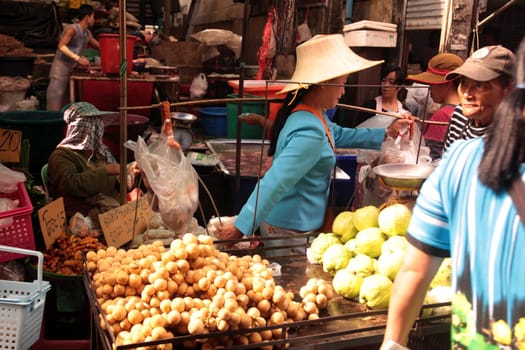 People at the Talat Warorot in the city of chiang mai in the north of Thailand in Southeastasia. ...