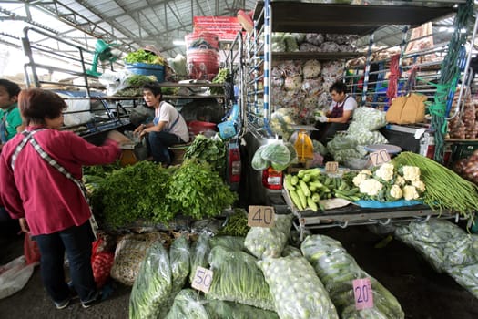 People at the Talat Warorot in the city of chiang mai in the north of Thailand in Southeastasia. ...