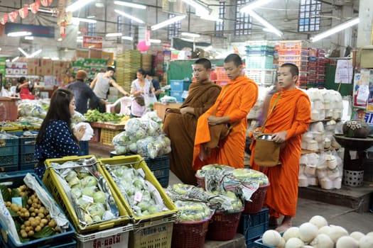 monk at the Talat Warorot in the city of chiang mai in the north of Thailand in Southeastasia. ...