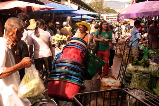People at the Talat Warorot in the city of chiang mai in the north of Thailand in Southeastasia. ...