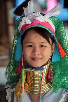 a traditional longneck women of the Paudang minority from Burma in a village north of chiang mai in the north of Thailand in Southeastasia. ...