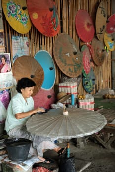 an Umbrella Factory near the city of chiang mai in the north of Thailand in Southeastasia. ...