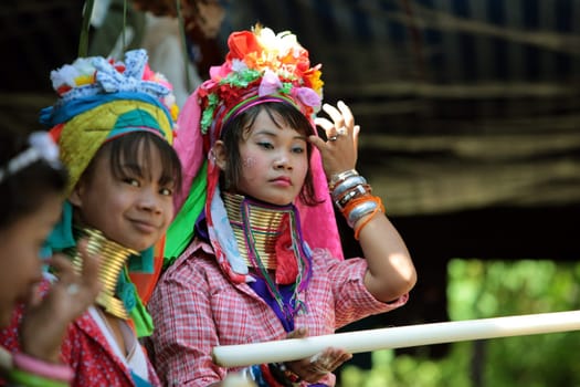 a traditional longneck women of the Paudang minority from Burma in a village north of chiang mai in the north of Thailand in Southeastasia. ...