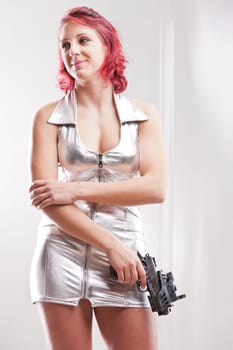 super hero space vintage costume girl waiting with a futuristic gun