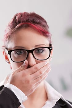 red haired office worker realizing she made a mistake