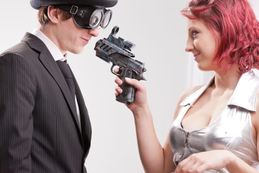 a weird couple of strange business superheroes in which she loves and hates him and they are attracted and the have to kill each other