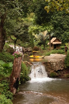 a waterfall in the Tropical Forest near the Village of Fang north of the city of chiang mai in the north of Thailand in Southeastasia. ...