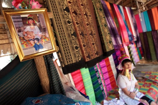 a traditional longneck women of the Paudang minority from Burma in a village north of chiang mai in the north of Thailand in Southeastasia. ...