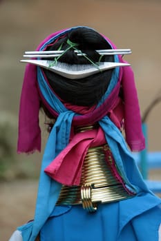 a traditional longneck women of the Paudang minority from Burma in a village north of chiang mai in the north of Thailand in Southeastasia. ...