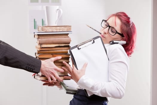 indifferent man overloading colleague woman with work