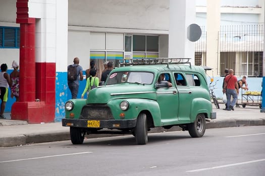 the old classic american car along the street at the Old Havana