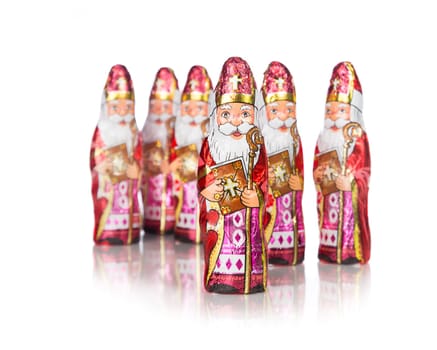Close up of Sinterklaas. Saint  Nicholas chocolate figure of  Dutch character of Santa Claus.Isolated on white background.