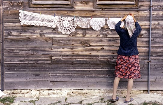 a women in the old town of Nesebar on the coast of the Black sea in Bulgaria in east Europe.