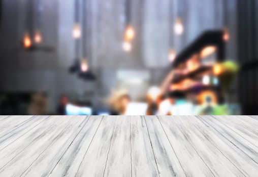 White table top wooden with blurred background. product display template